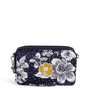 Collegiate RFID All in One Crossbody Bag-Navy/white rain garden with university of notre dame logo in Cotton